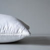 White linen pillow cover with white lace trim, with invisible zipper closure