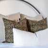 Aja floral block print pillow covers styled on modern bed with neutrals