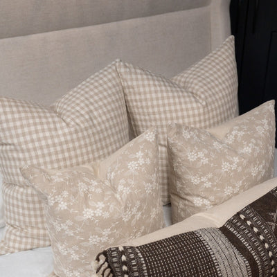 Gingham linen double sided pillow covers on neutral bed