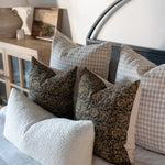 Gingham linen double sided pillow covers styled on bed with warm neutrals