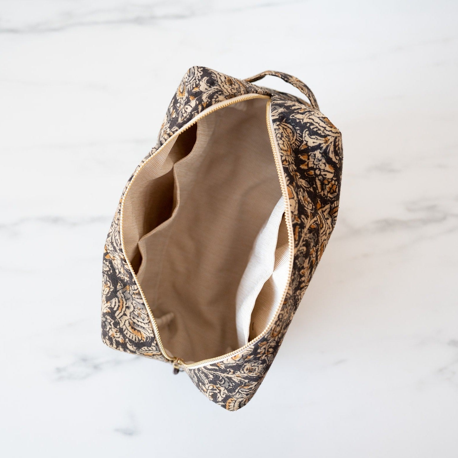 Block print toiletry bag with interior pockets
