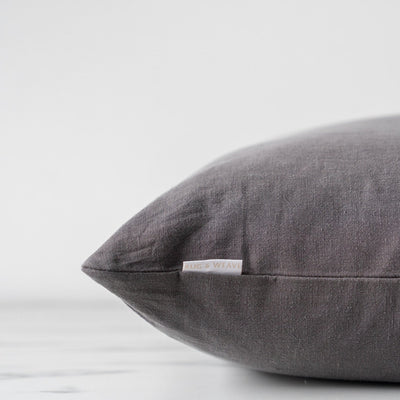 Charcoal double sided pillow with exterior label