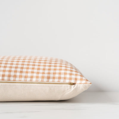 Light brown gingham pillow cover with brass zipper closure
