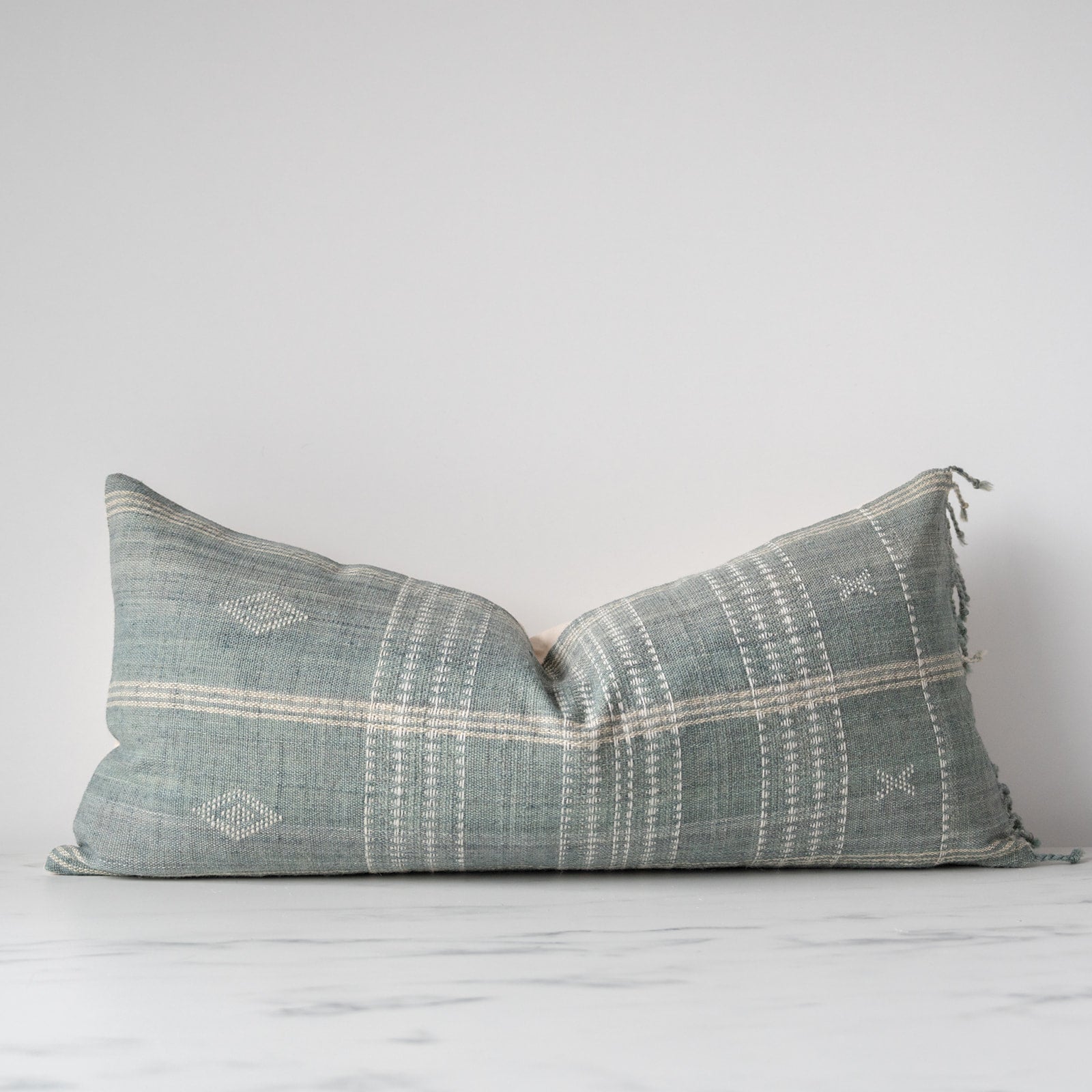 Sage bhujodi long lumbar pillow cover with fringe on side
